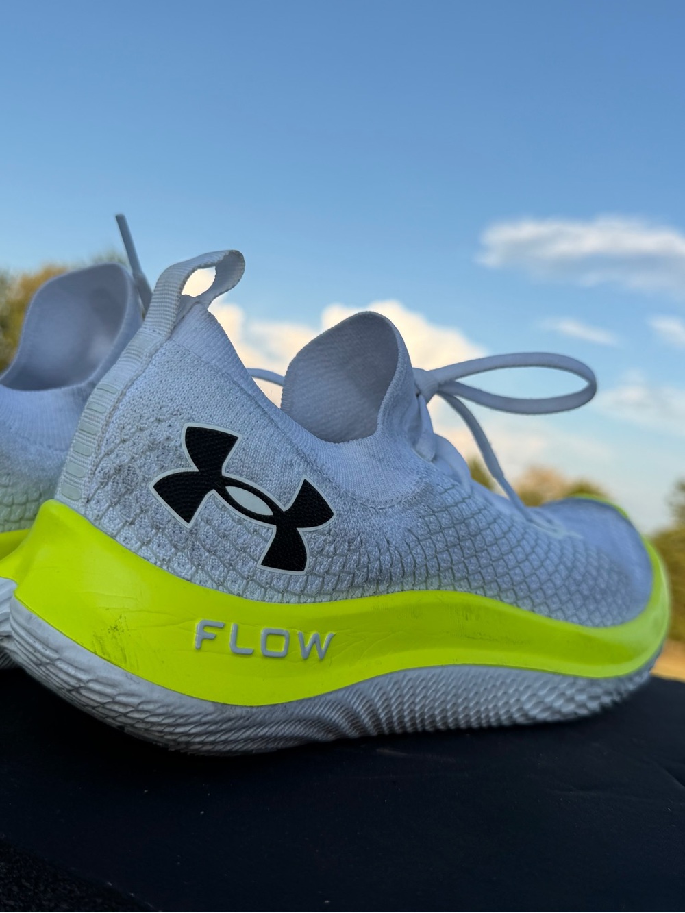 Under Armour Flow Velociti SE in the "White / High-Vis Yellow"